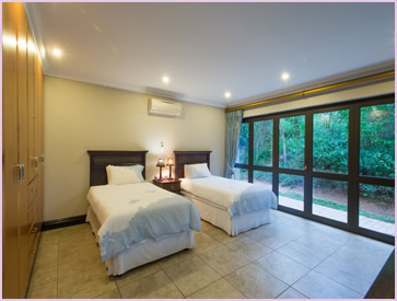 Bedroom 5 of the Zimbali Holiday Home's Acaciawood villa