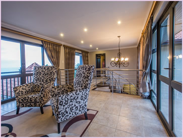 Upstairs lounge at Zimbali Holiday Home's Acaciawood villa